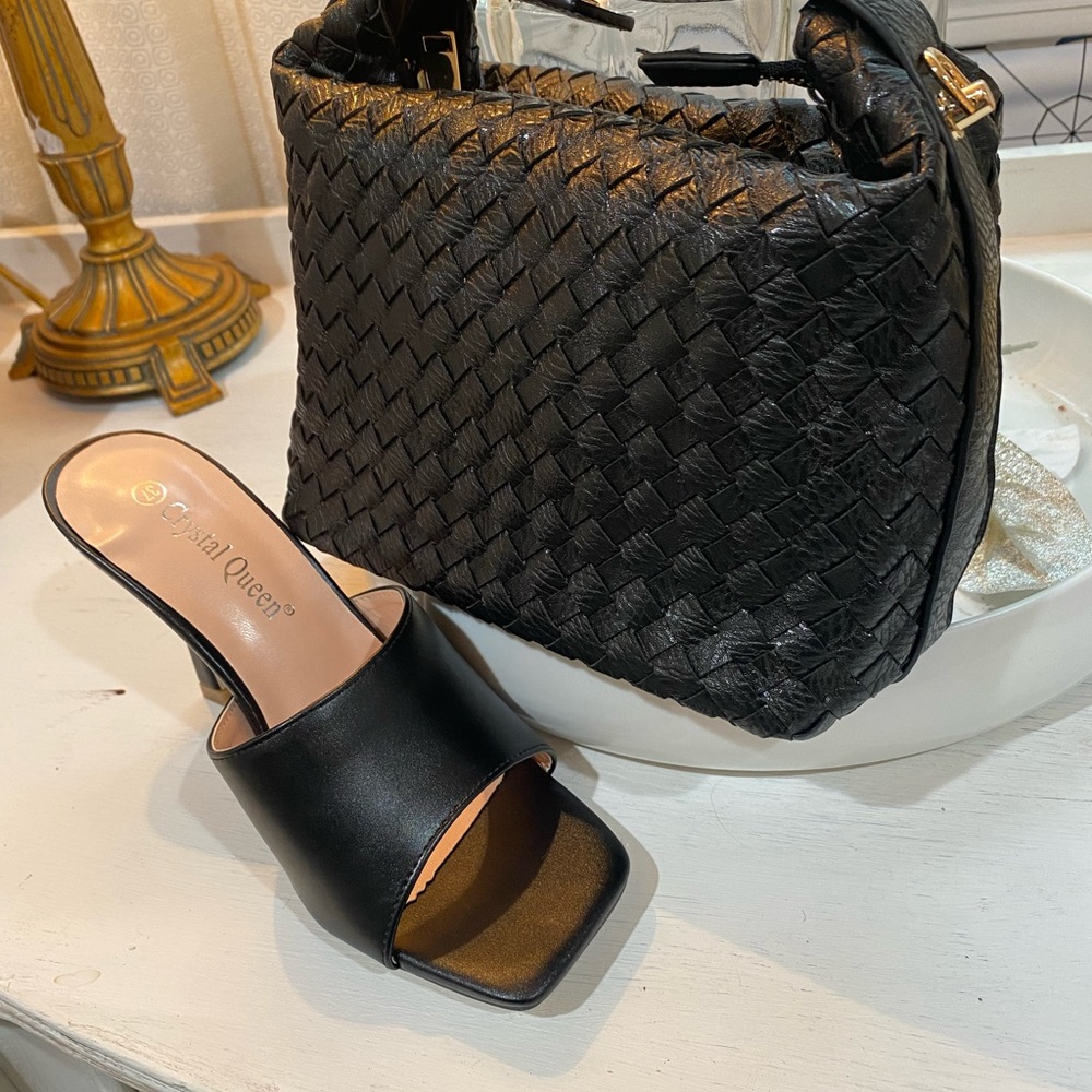 Black leather slides